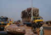 top-heavy truck a Ouaga bus stop.JPG (220706 bytes)